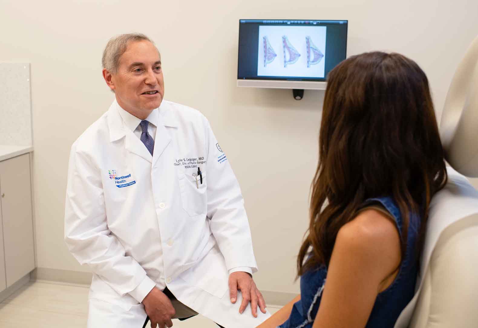 Dr. Leipziger meeting with a patient for breast enhancement
